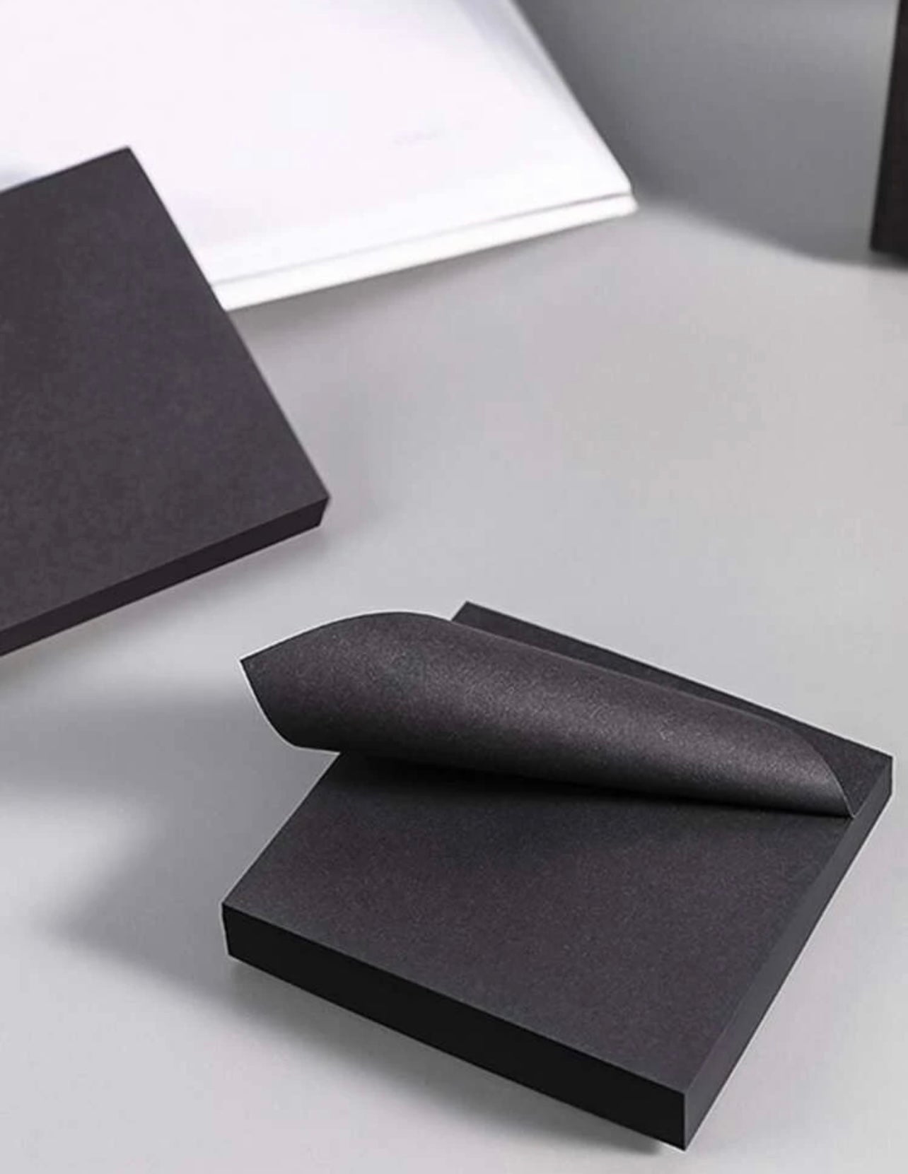 Plain black sticky note